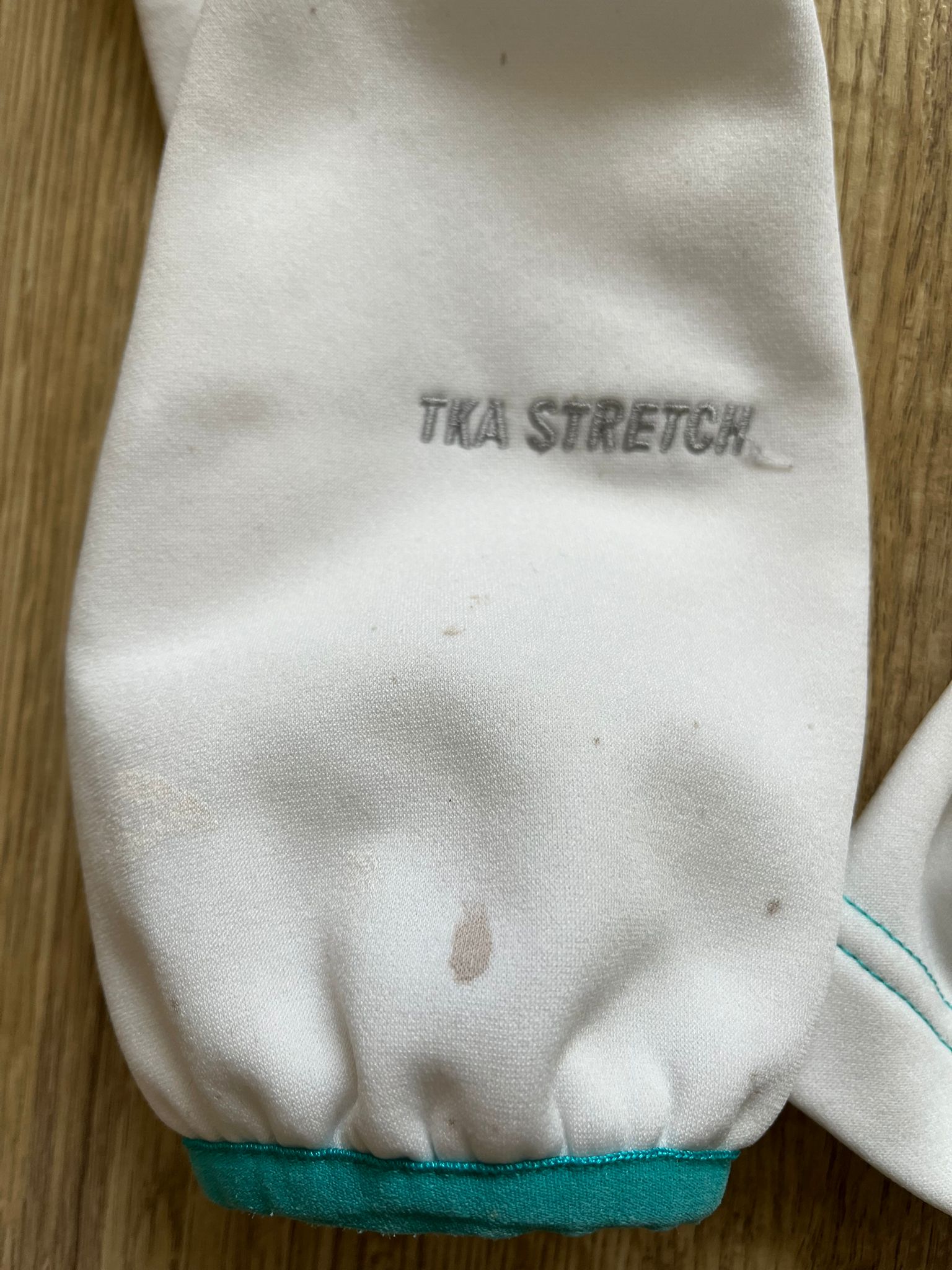 The North Face бял полар с качулка и зелени детайли дамско